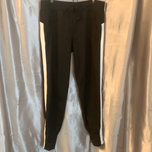 Athleta black joggers with white stripe down the side in excellent condition. - Picture 1 of 7